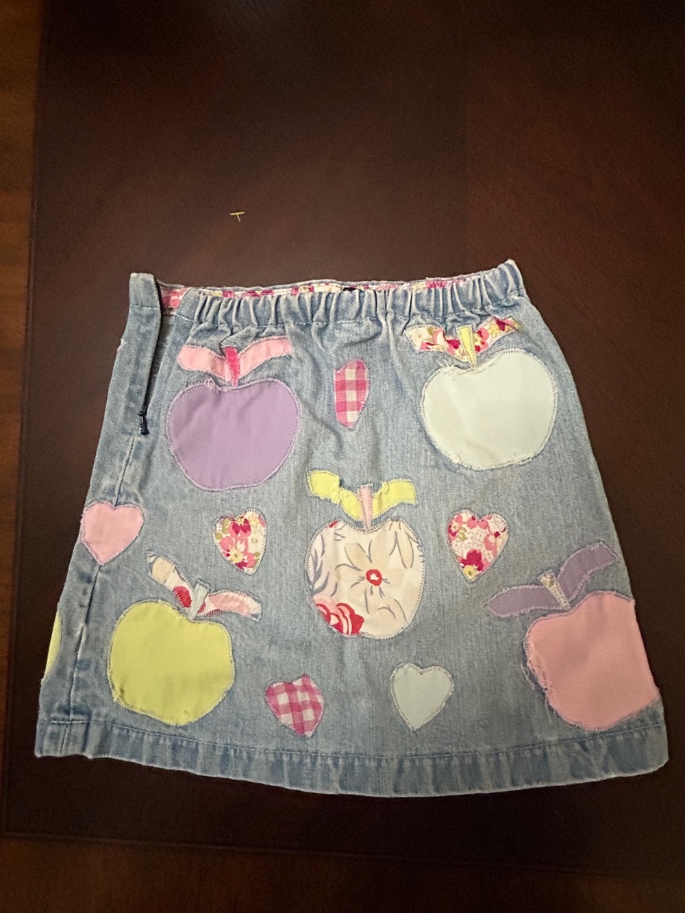 Mini Boden Denim Skirt with Pastel Apple and Heart Appliqués